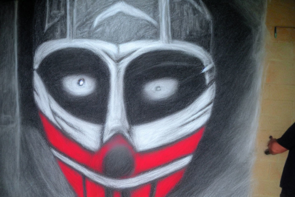 Monochromatic drawing of a menacing mask with red accents and abstract details