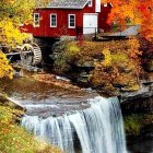 Watercolor painting of red house on waterfall amid autumn foliage