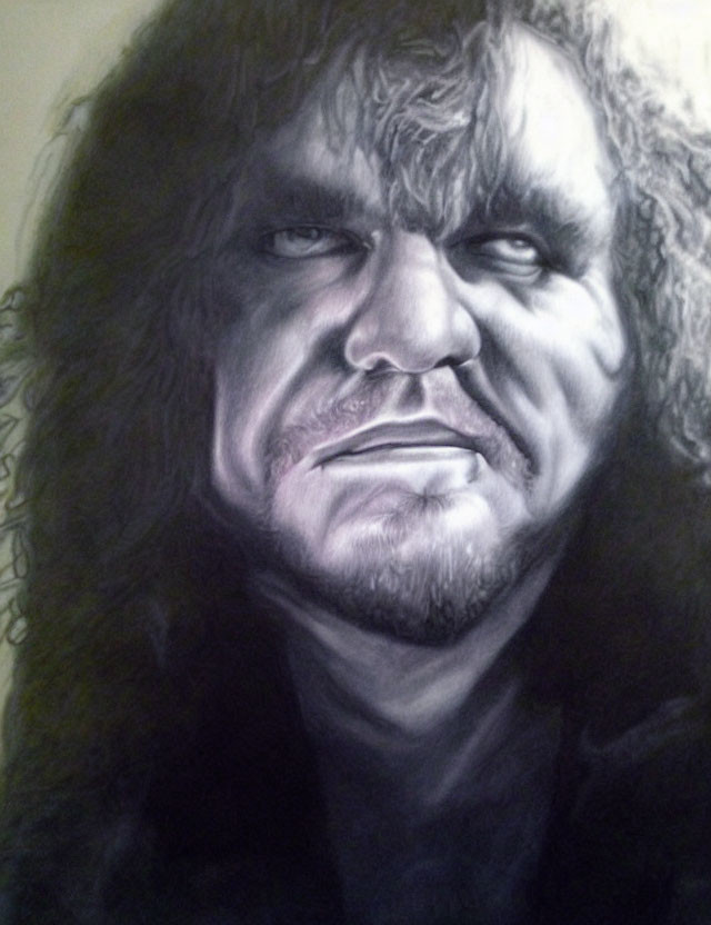 Monochrome portrait of intense long-haired man