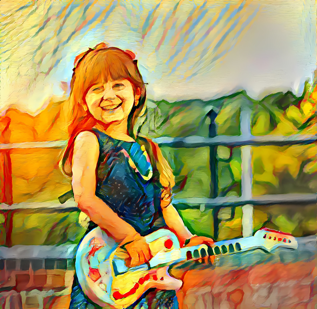 Little girl with guitar
