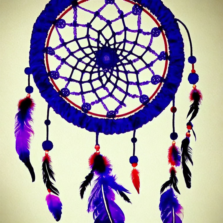 Blue and Purple Dreamcatcher with Beads and Feathers on Pale Background