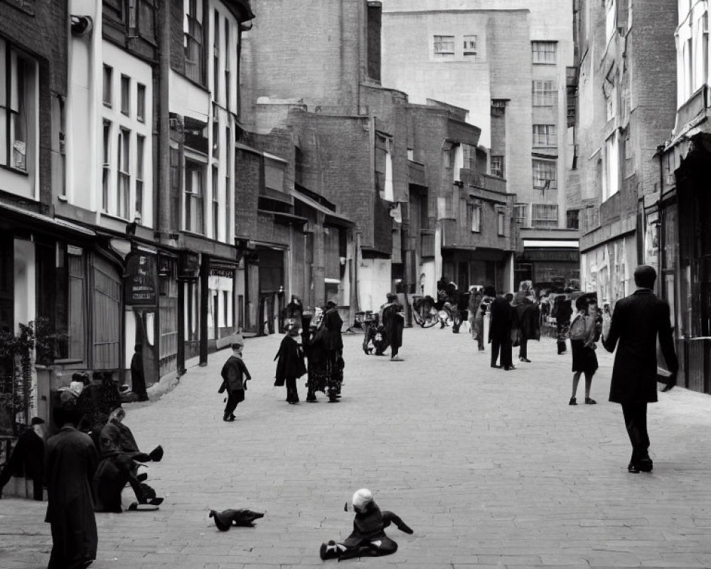 Monochrome photo of busy street with people, child, and dog playing