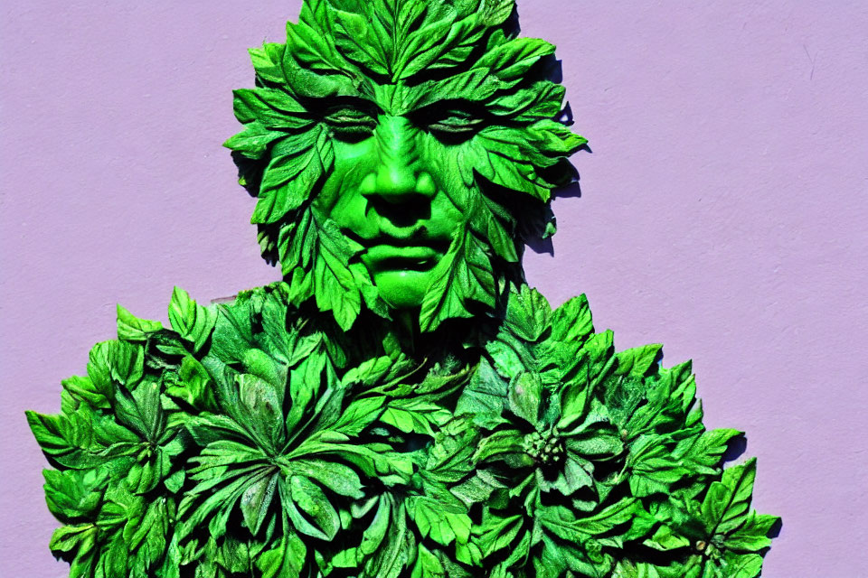 Intricate Leaf-Patterned Green Sculpture on Purple Background