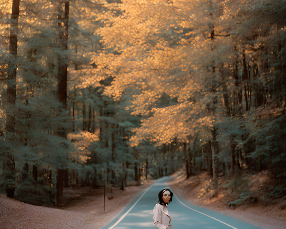 Woman in White Coat on Vivid Blue Road in Autumn Forest