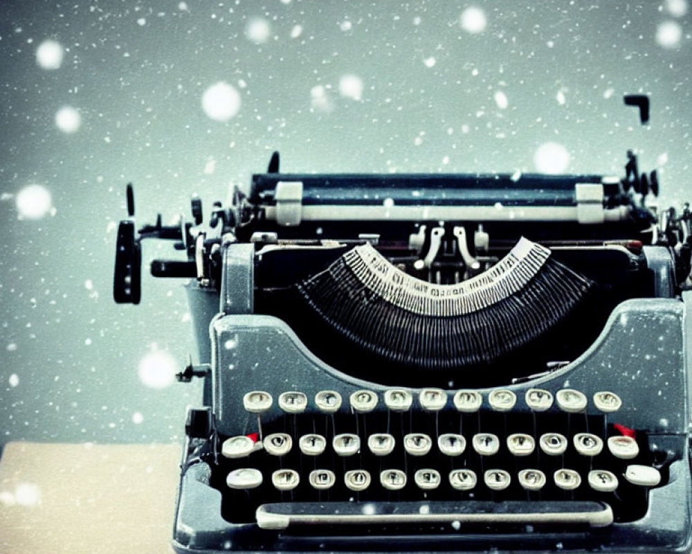 Vintage Typewriter on Table with Falling Snowflakes and Bokeh Effect