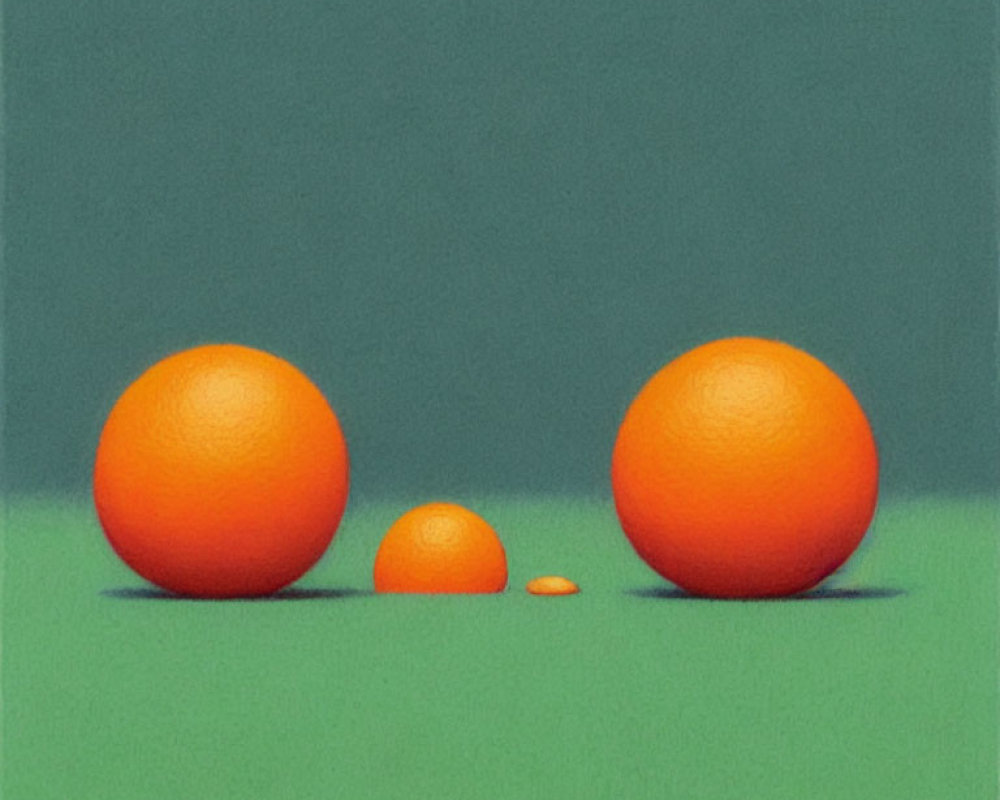 Three Oranges Arranged on Green Background