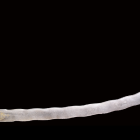 Curved sword with sharp edge and hilt on dark background