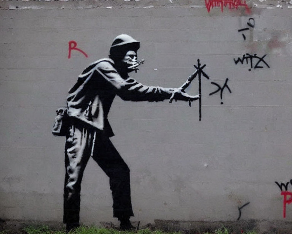 Monochrome graffiti art featuring person painting star with tags