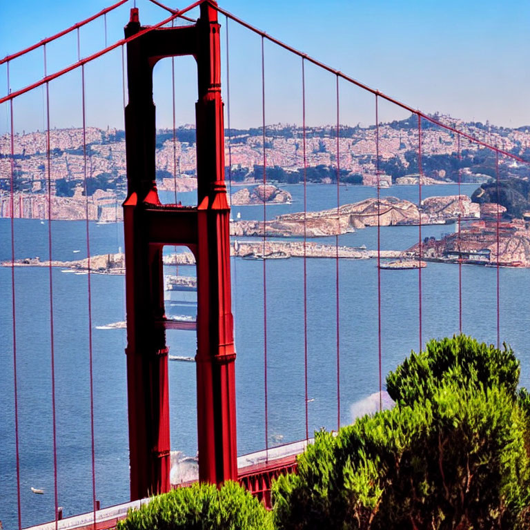 Red Suspension Bridge Tower with Cityscape and Bay View