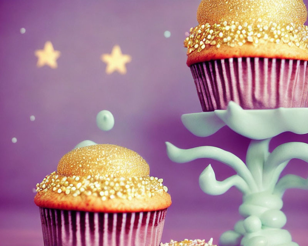 Golden-Glittered Cupcakes on Purple Background with Stars