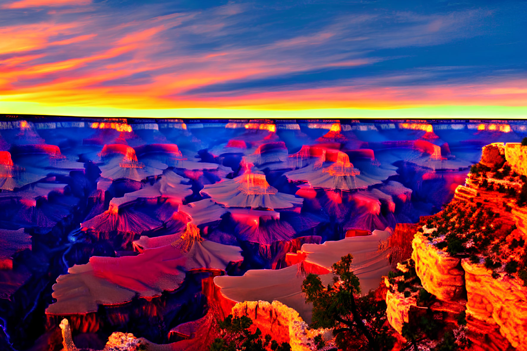 Stunning Orange and Blue Sunset Over Grand Canyon Rock Formations