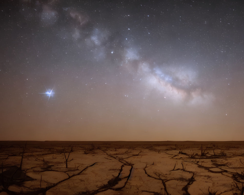 Starry Night Sky with Milky Way and Meteor over Desert Landscape