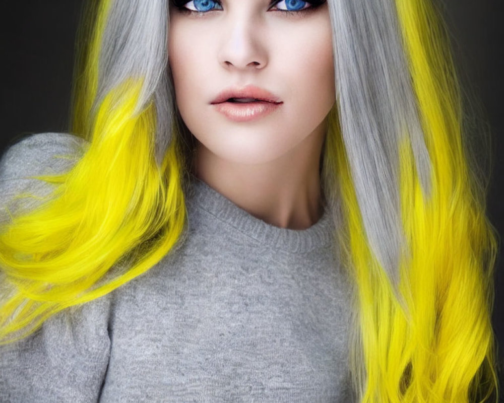 Woman with Blue Eyes and Grey-to-Yellow Ombre Hair in Grey Sweater