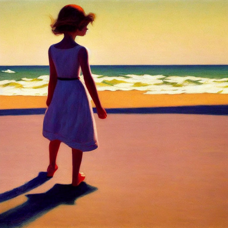 Young girl in blue dress on sandy beach gazes at ocean