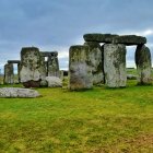 Ancient Stonehenge Monument with Standing Stones and Lintels on Green Field