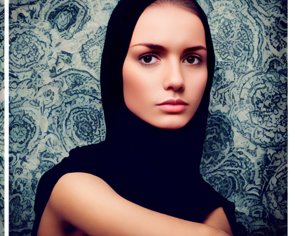 Woman in Black Headscarf Against Floral Background with Thoughtful Expression